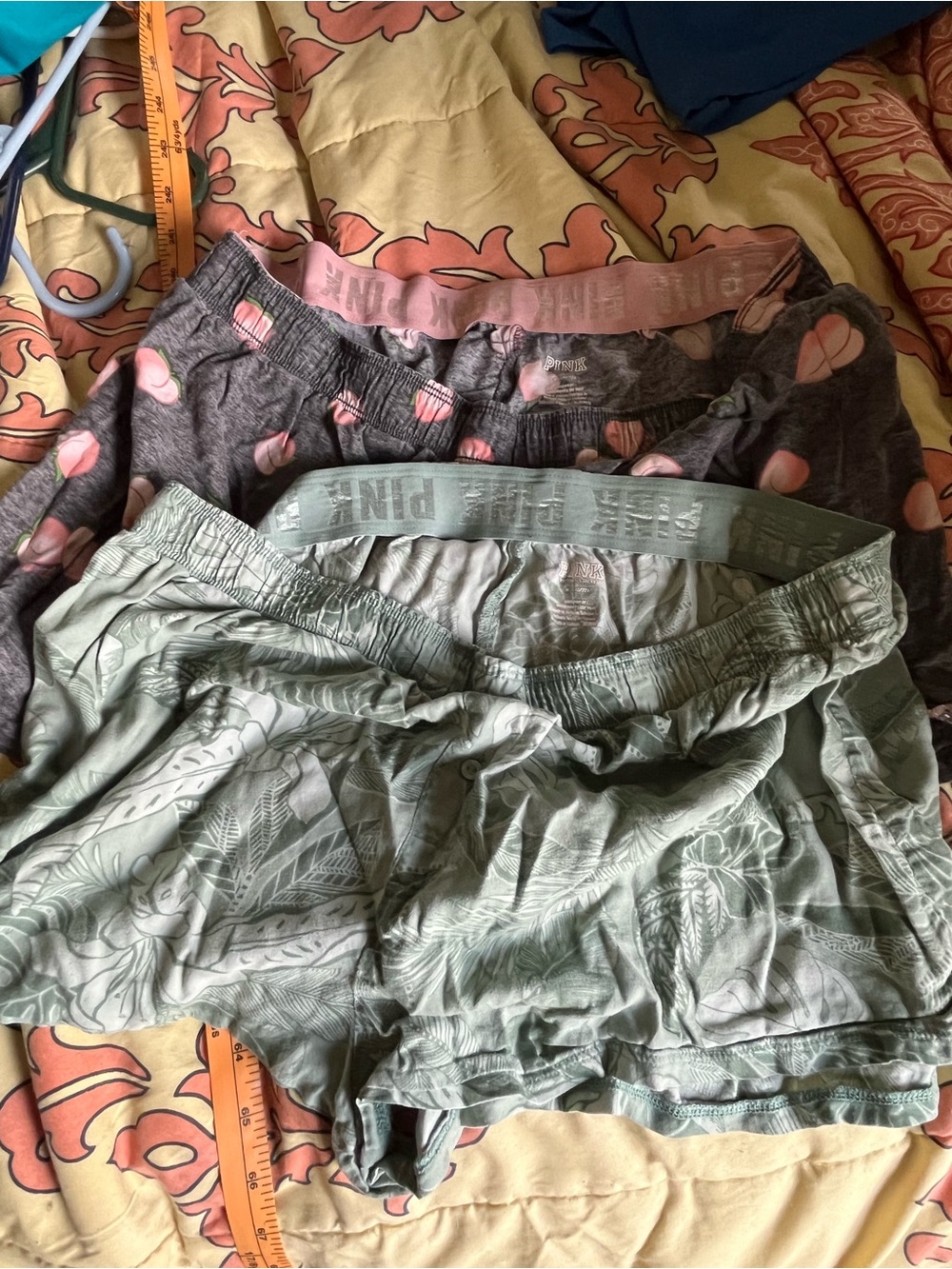 2 pairs of PINK shorts. Both size medium.